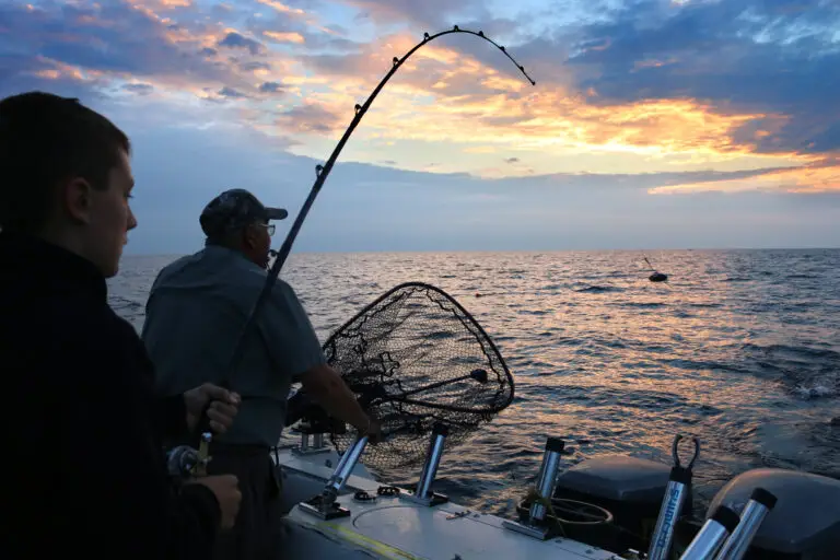 Ed Retherford engaging 4-H Great Lakes and Natural Resources Camp youth in Lake Huron fishing experience (Michigan Sea Grant photo)